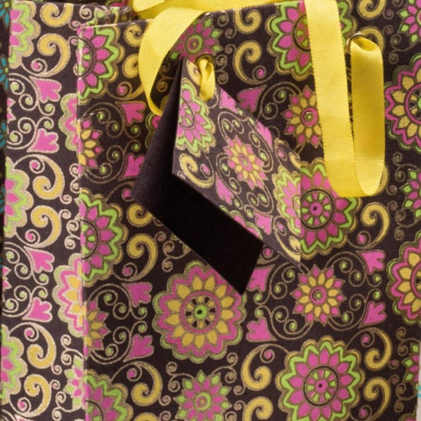 Thumbnail: Close-up of Handmade Paper Gift Bags with Tags in Pink featuring beautiful floral motifs and intricate detailing in gold
