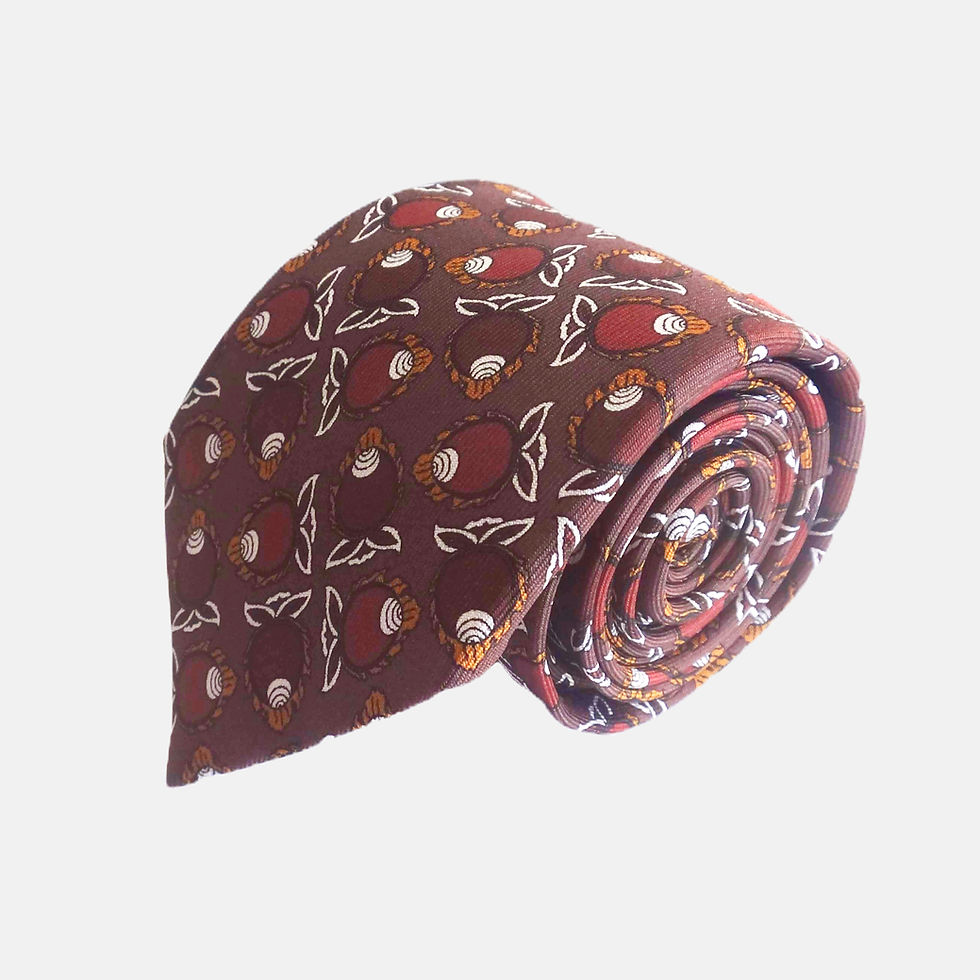 Conch Motif Silk Tie in a repeat pattern, smooth to touch and features earthy brown tones.