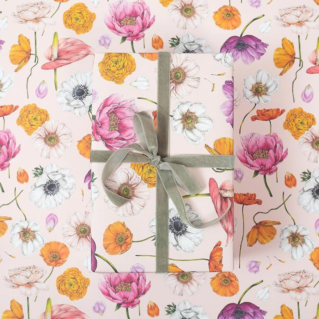 Thumbnail: Eco wrapping paper with yellow, purple and orange summer florals scattered against a pale pink base.