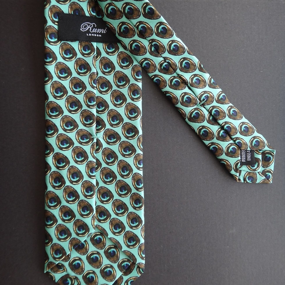 Thumbnail: Handmade pure silk peacock feather motif tie featuring a repeat pattern on a lovely turquoise  base.