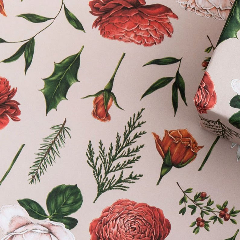 Thumbnail: Eco wrapping paper with red and white roses and green leaves  scattered against a pale pink base.