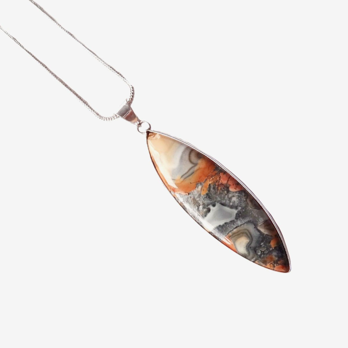 Maligano Jasper Pendant Necklace features a fish-shaped bezel pendant, hand set within a 925 sterling silver plated brass set