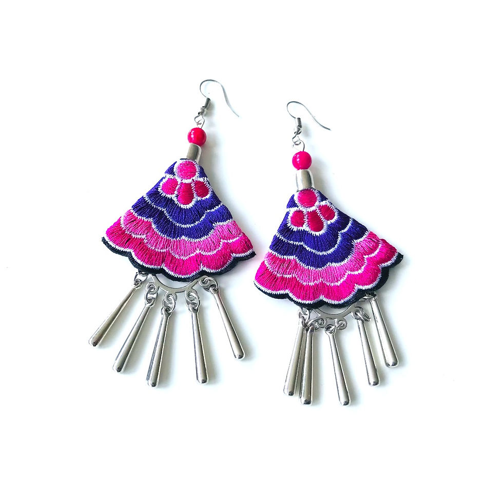 Thumbnail: Embroidered earrings in wavy pink and purple embroidery shaped like a fan and suspended from a hook.