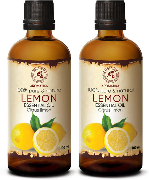 Two bottles of Lemon Essential Oil with lemons, 100% pure & natural.