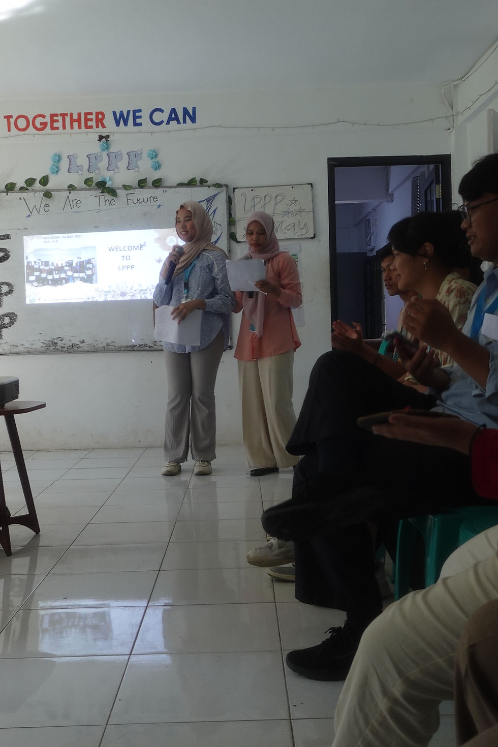 Silpia doing the MC for the graduation ceremony