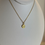 Thumbnail: Evil Eye Round Minimalist Necklace