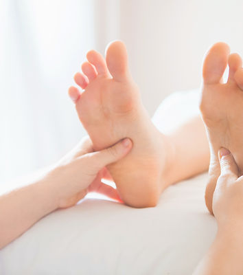 Foot massage therapy session_edited.jpg