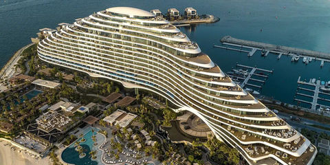 Aerial view of Marsa Al Arab, Dubai, showing the luxury waterfront development beside Burj Al Arab, marina and yacht berths.