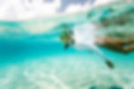 snorkeling woman at andaz turks and caicos residences