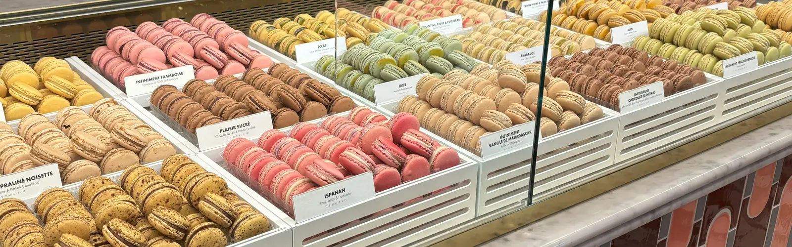 Colorful Pierre Hermé macarons tasted during Paris chocolate and pastry tour