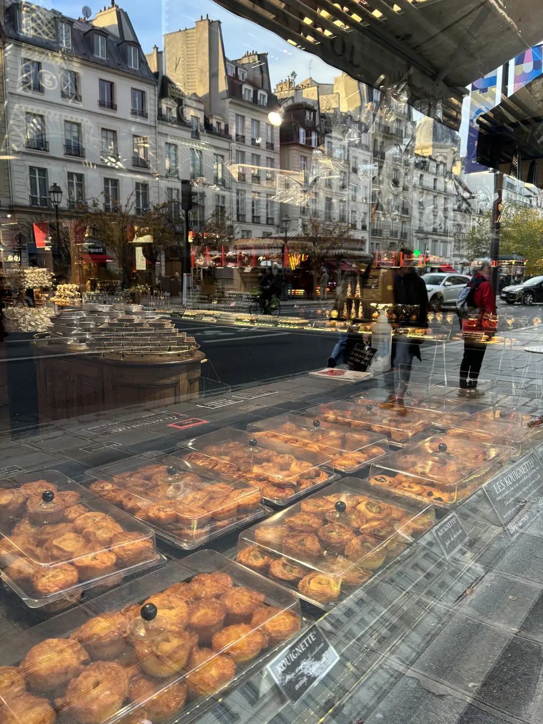 Pralus shop window with famous Praluline brioches in the Marais, Paris