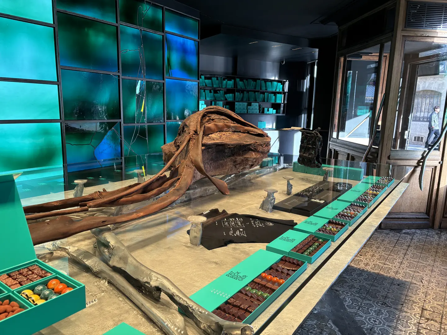 Patrick Roger chocolate shop with signature bronze sculpture in Paris