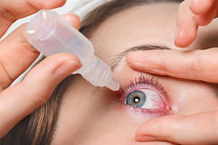 close-up-female-pours-drops-red-eye-has-