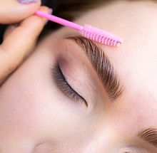 Woman Having Eyebrow Shaping Treatment