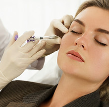 Woman receiving wrinkle relaxing treatment