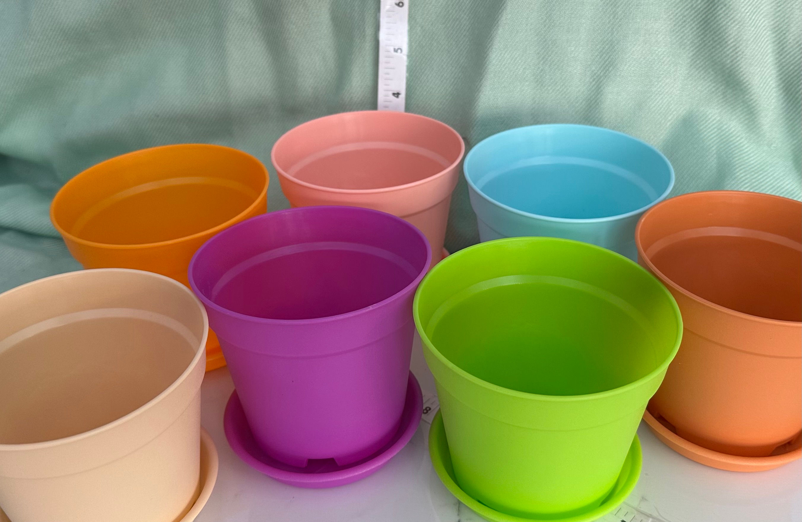 Colorful 4 inch plastic pot with drain holes and saucer