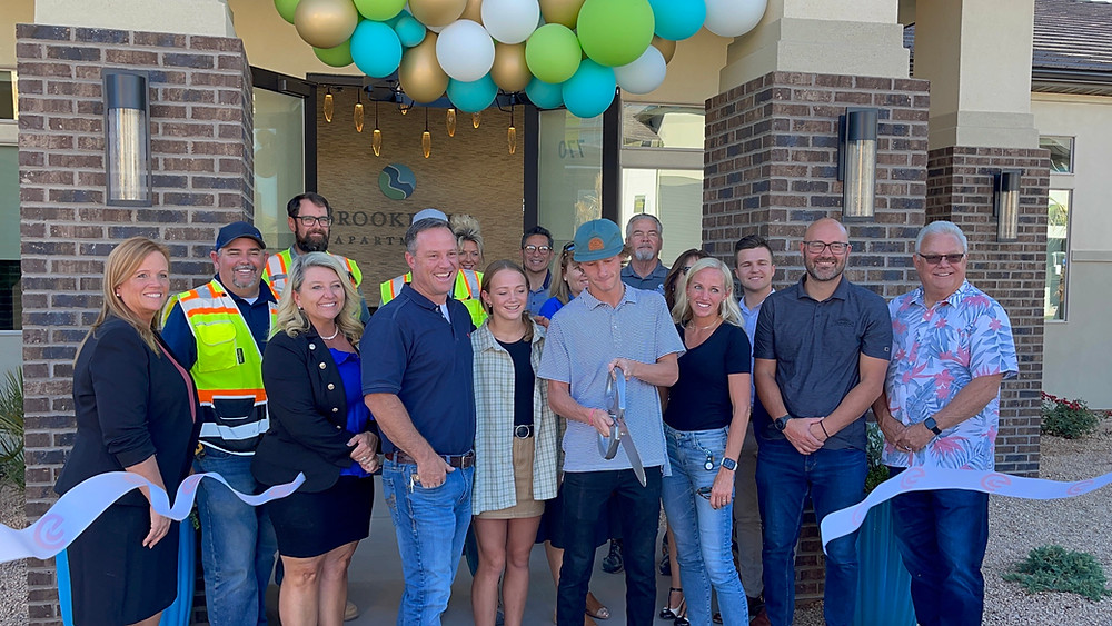 In early October, the St. George Office celebrated the Grand Opening of the Brookfield Apartments Clubhouse. It features a state-of-the-art fitness center, children’s room, lounge and patio, pool, hot tub, and several grilling stations. The clubhouse acts as a gathering space for the residents of the Brookfield Community in St. George, UT.