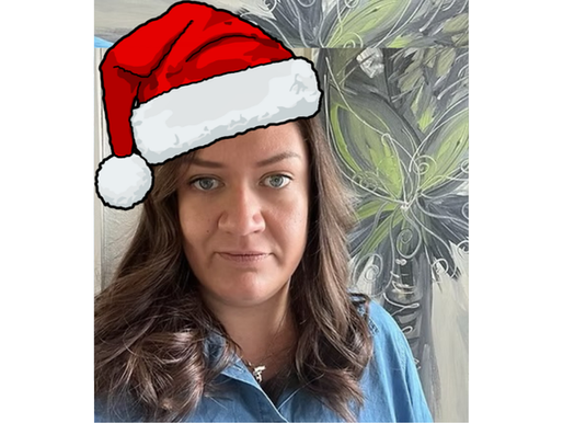 Picture of the National Secretary wearing a Santa hat.