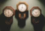 3 wood cuckoo clocks all displaying different times