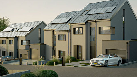 Maisons modernes à Syren avec panneaux solaires intégrés et jardins soignés.
