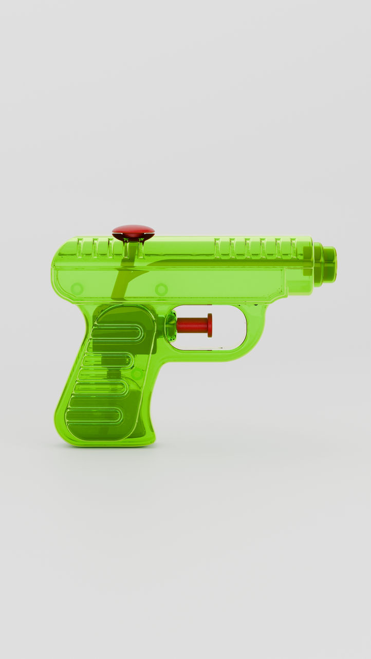 Green water gun repurposed as an olive oil dispenser for food seasoning