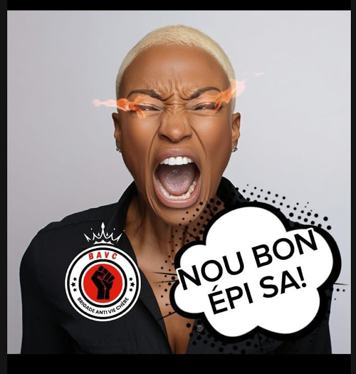 La femme représentée, avec une expression de colère intense, incarne la voix des citoyens qui en ont assez de supporter des prix exorbitants pour des biens de consommation courante. Le slogan "NOU BON ÉPI SA!" (Nous en avons assez de ça!) capture parfaitement ce sentiment d'épuisement et de révolte collective.