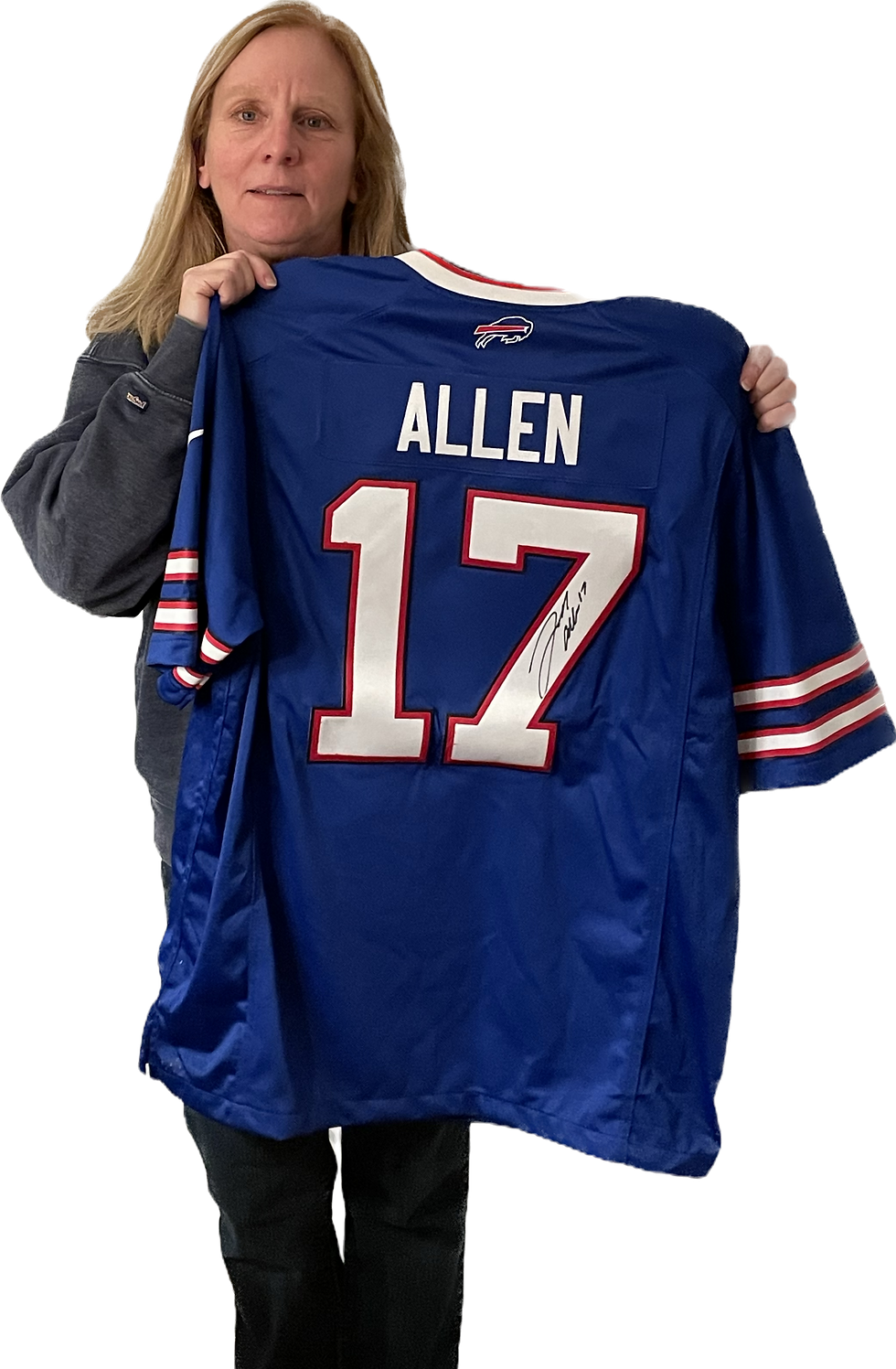 Photograph cut-out of a woman, Cindy Rodgers, posing with a blue, Buffalo Bills, Josh Allen, autographed jersey, number 17.