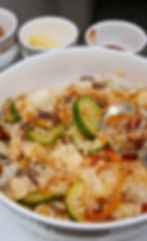 Bibimbap mixed with sauce