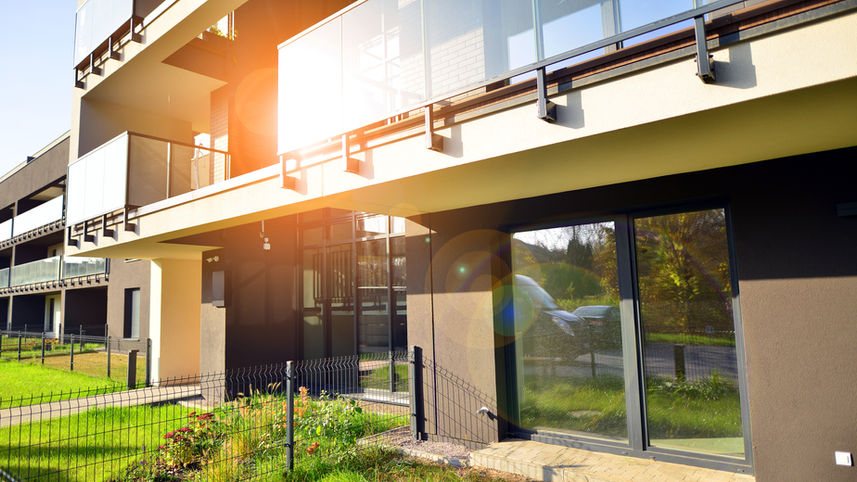 Wise painting -New-Apartment-Building-On-A-Su-464798975.jpg