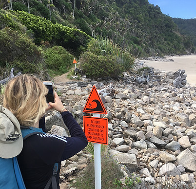 Warning sign for the beach and wavesIMG_