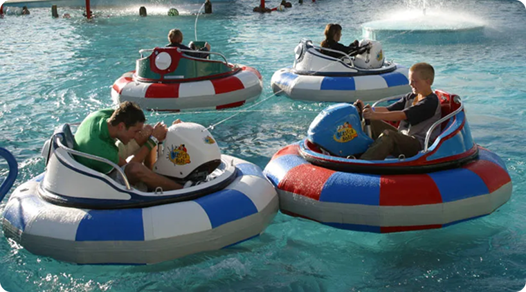 Friend group competing against each other in the bumper boats