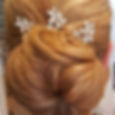 Wedding hair low bun swept back hair up