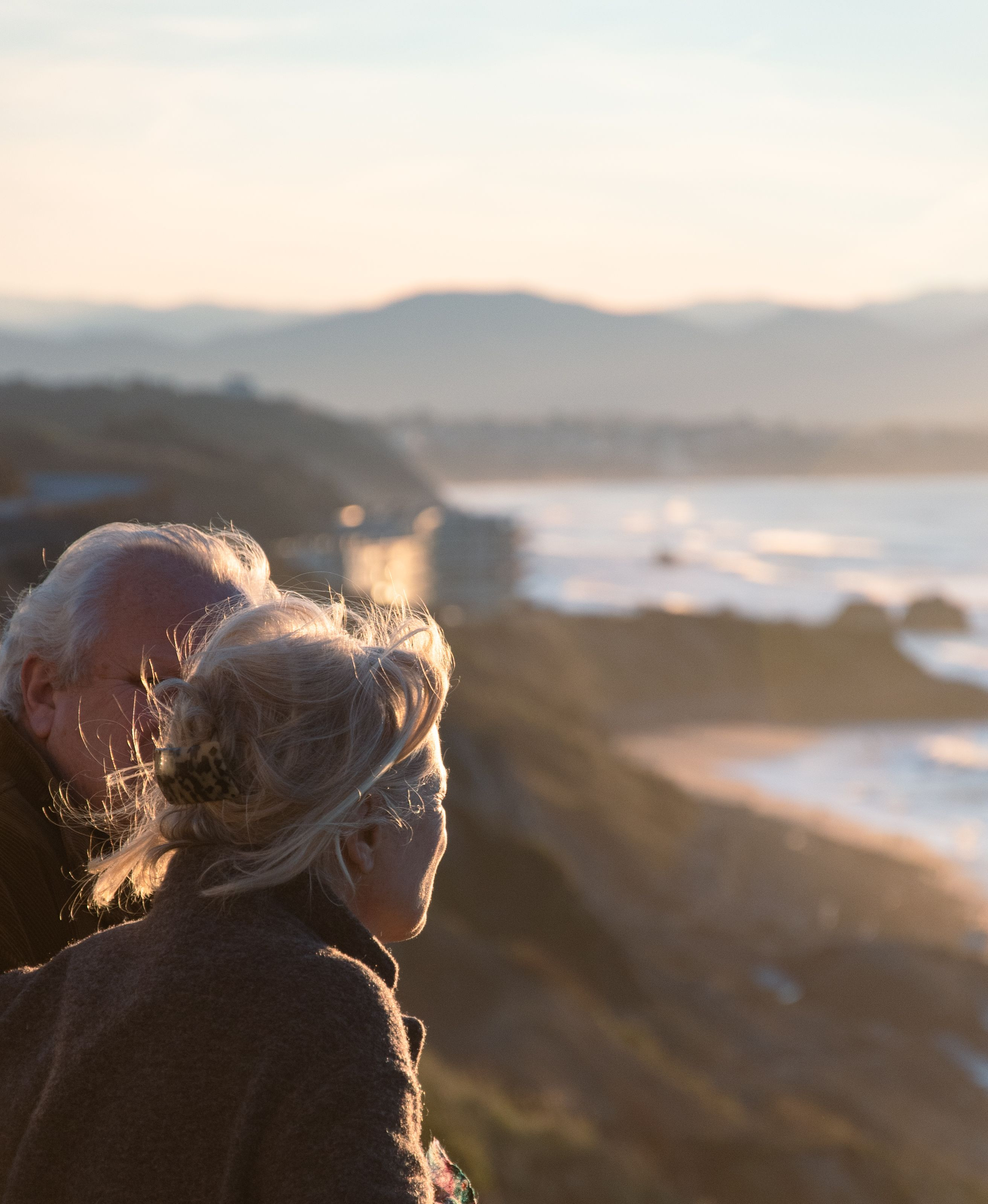 Older couple overlooking coast