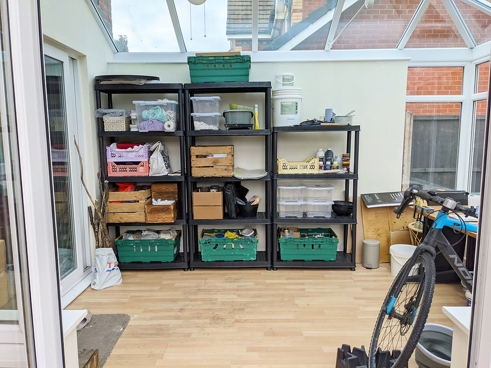 Home studio shelving units and boxes.