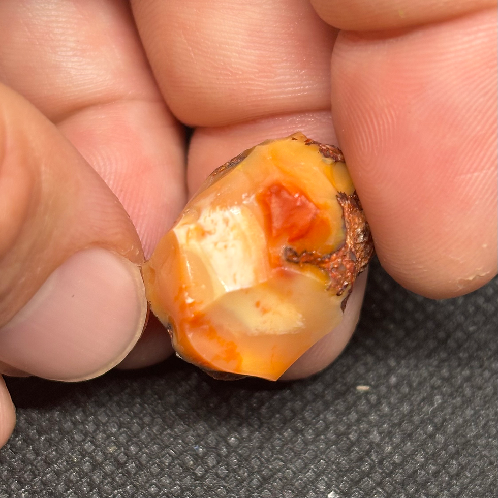 Thumbnail: Mexican Fire Orange Punch Opal Stone Specimen Portraying A Beautiful Light Show