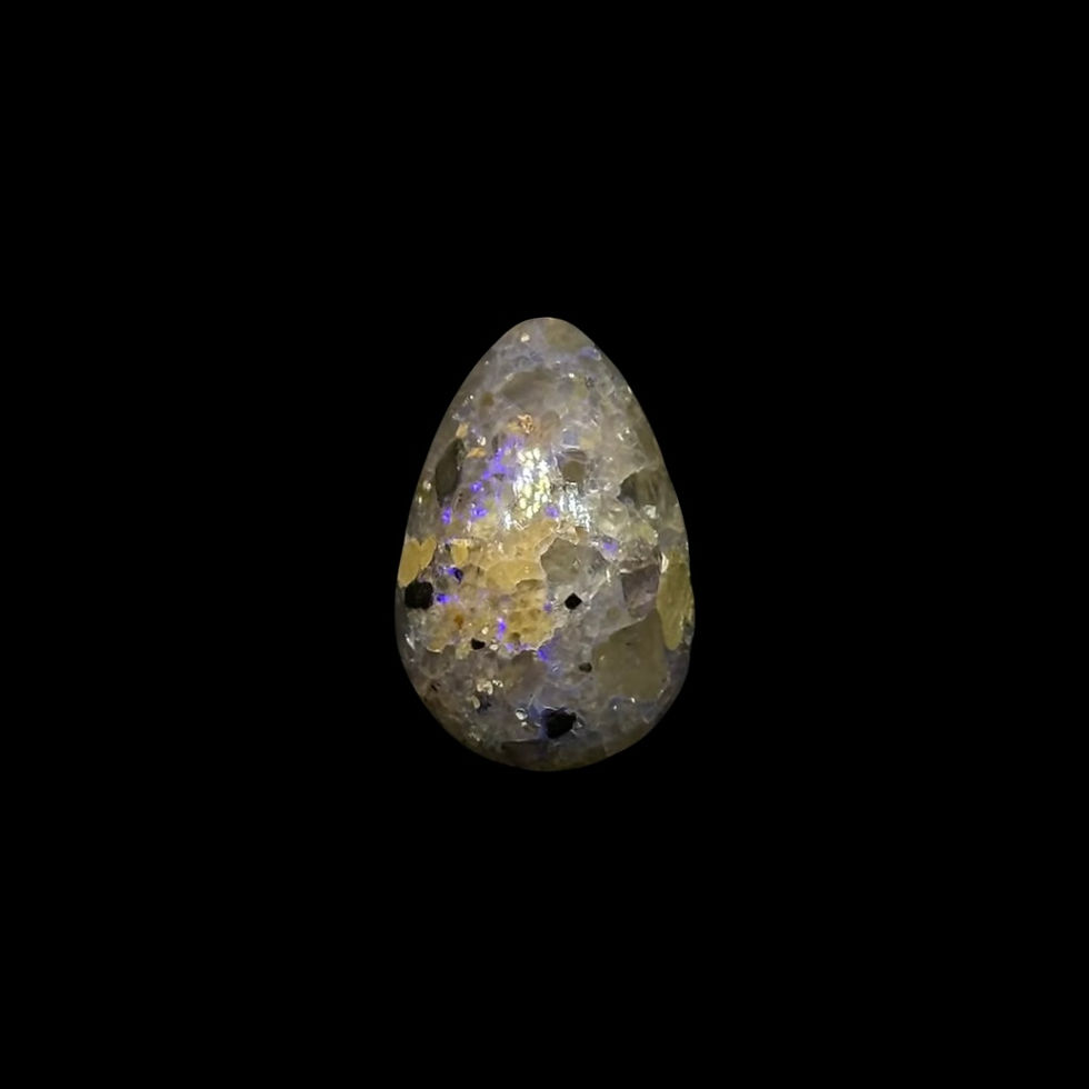 Thumbnail: Polished Pinpoint Louisiana Hidden Fire Opal Stone