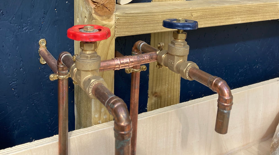 Handmade copper taps in the field kitchen