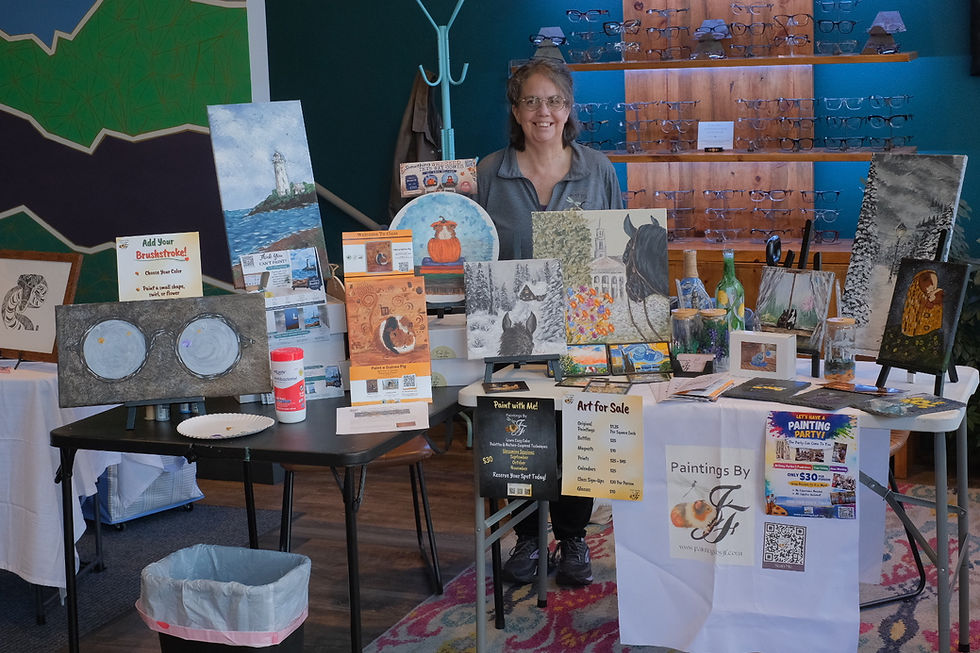 he full booth display showcased original artwork, interactive activities, class information, and handcrafted artistic creations.