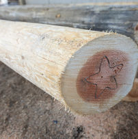 Star lock installed on utility pole end to prevent splitting and improve durability