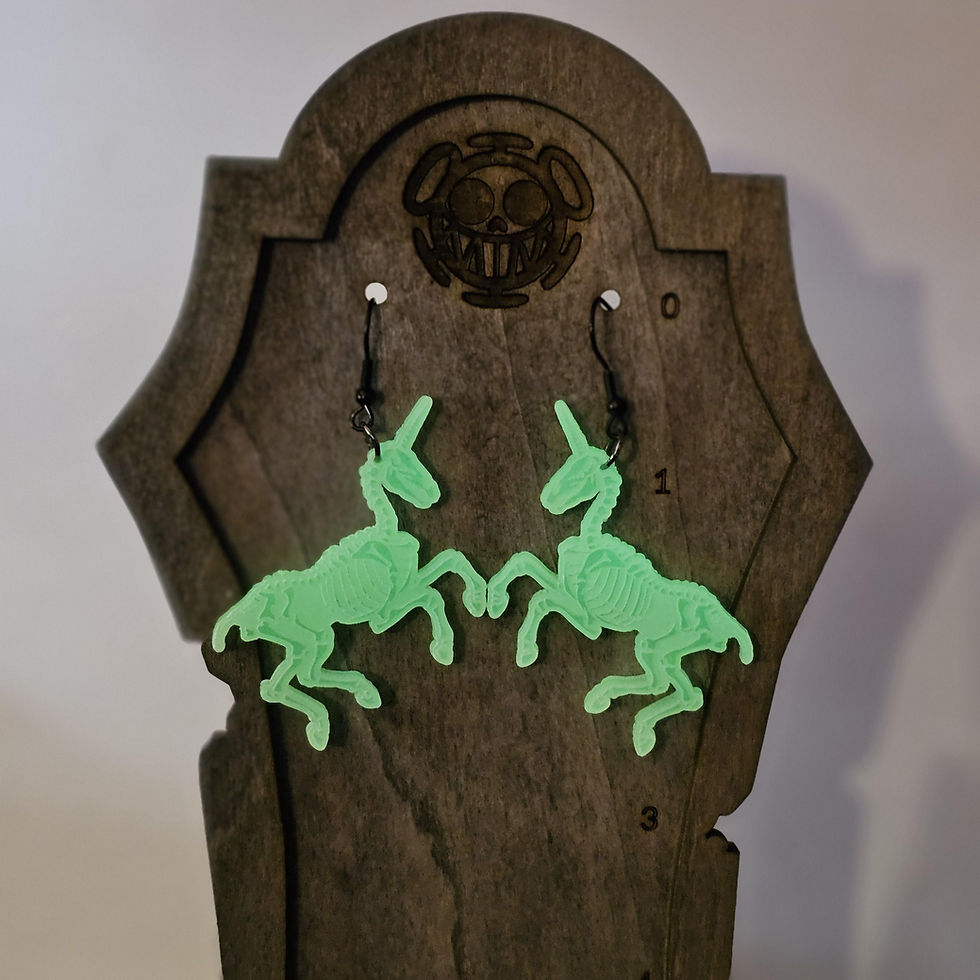 Thumbnail: Glow in the Dark Skeleton Unicorn Earrings