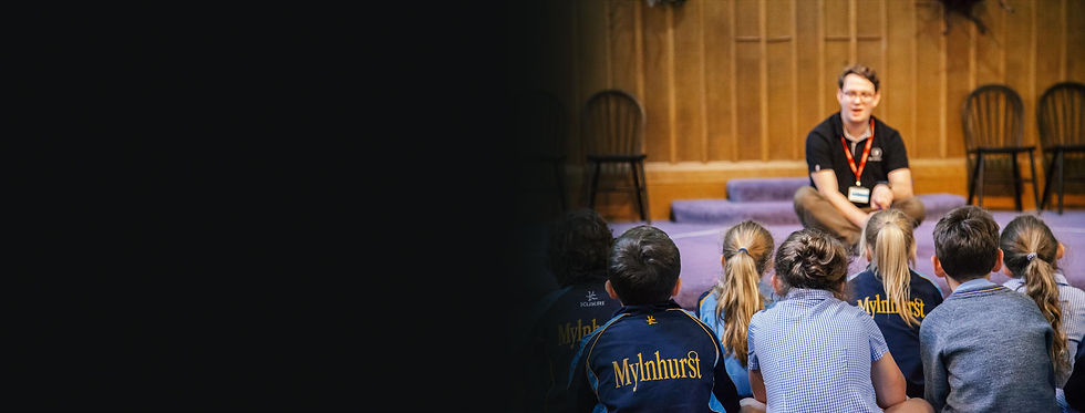 Sent Into Space team member speaking to students in a classroom.