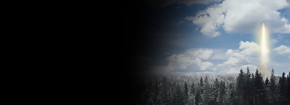 Rocket taking off from snowy woodland.