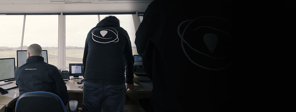 Sent Into Space team memebers monitoring a spaceflight from air traffic control tower.