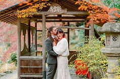Photo source: https://www.samspicerphotography.com/blog/autumn-elopement-japanese-garden-kyoto 10. Kyoto, Japan A whisper of its name feels like stepping into a delicate poem, where every petal, every temple, every quiet garden holds a story of love waiting to be told. I picture us there, two souls drifting beneath the soft blush of cherry blossoms, wrapped in the timeless elegance of a city in which past and present dance in perfect harmony. We’d begin our mornings wandering through Arashiyama Bamboo Grove, the towering stalks swaying gently above us like nature’s own cathedral. The soft rustle of leaves would be our soundtrack as we walk hand in hand, feeling like we’ve slipped into a secret world made just for us. Later, we’d find ourselves in the serene gardens of Kinkaku-ji, the Golden Pavilion shimmering in the sunlight, its reflection shimmering on the still pond like a promise of something precious and eternal. Here, every moment feels like a brushstroke of beauty painted just for our hearts. Afternoons call for the enchanting streets of Gion, where the graceful footsteps of geishas echo softly, and lanterns begin to glow like fireflies in the approaching dusk. We’d share quiet tea in a traditional teahouse, savouring the delicate matcha and the gentle rhythm of time slowing down around us. As evening falls, we’d climb to Fushimi Inari Shrine, following the endless trail of vermilion torii gates that seem to carry us deeper into a world where wishes and dreams come alive. Under the soft glow of lanterns, I’d whisper to you that here, in this ancient city, love feels like a sacred journey; one I want to take with you forever. Kyoto is a symphony of subtle moments, a place where every glance and every breath feels touched by poetry.