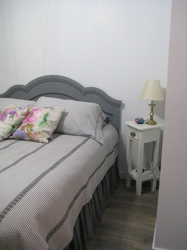 BedWithAntiqueTable.JPG
