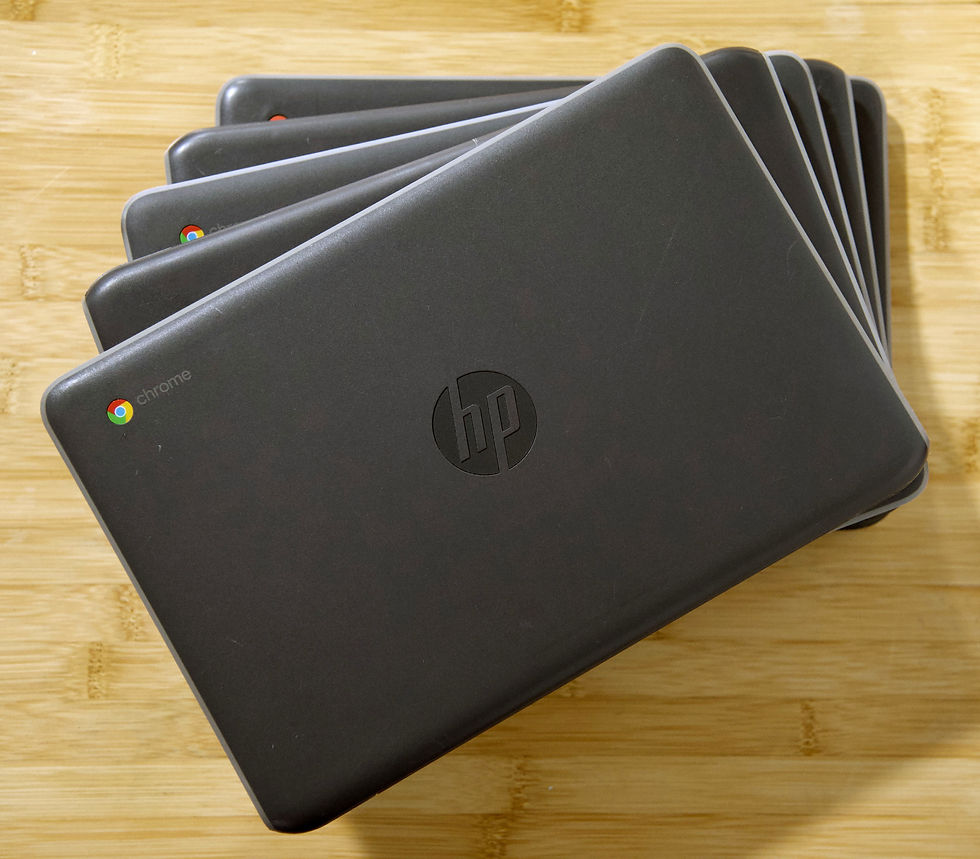 Stack of Chromebook devices representing available inventory for K-12 back-to-school deployment planning.