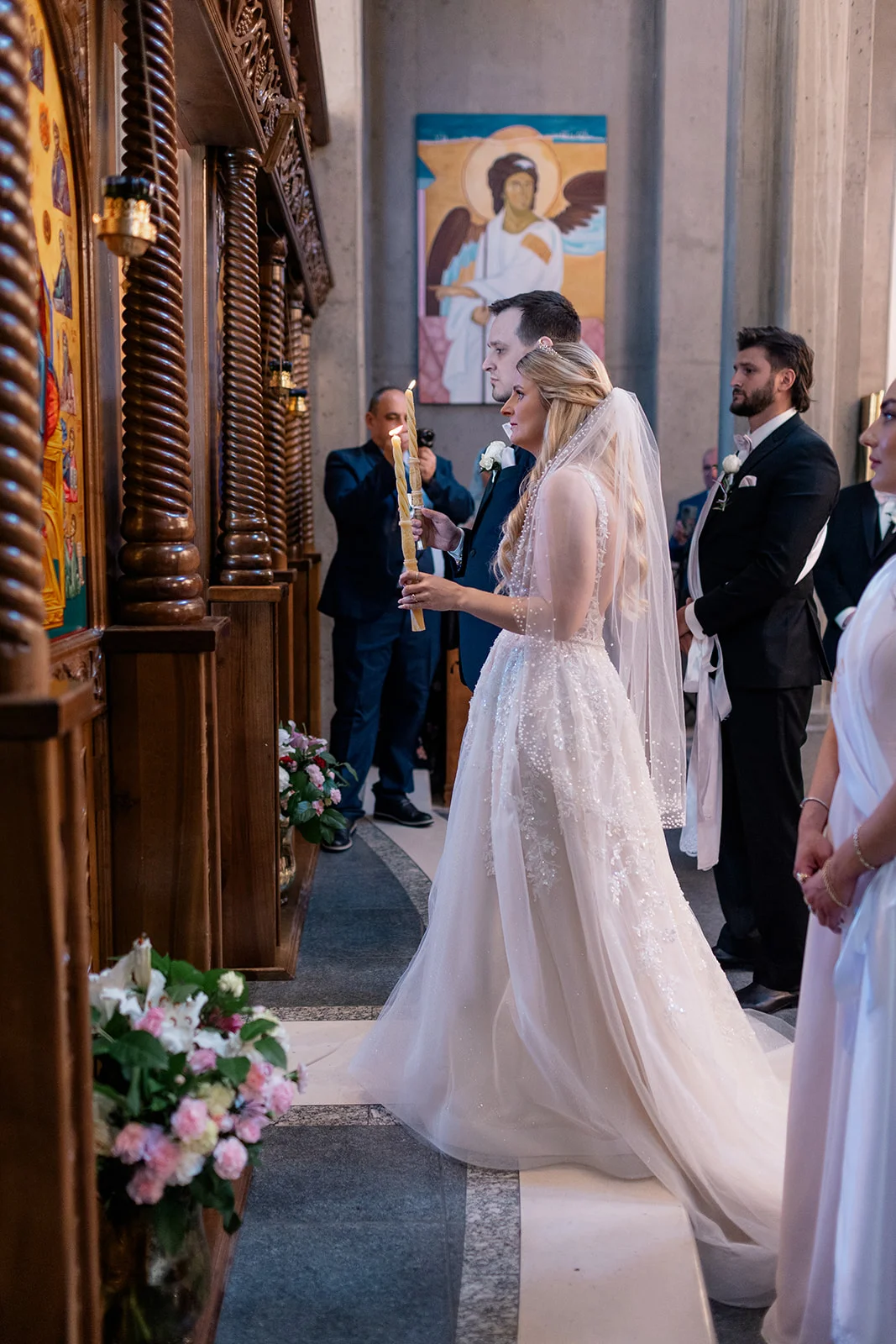 Serbian Orthodox wedding ceremony with traditional rituals including candles, crowns, and cords