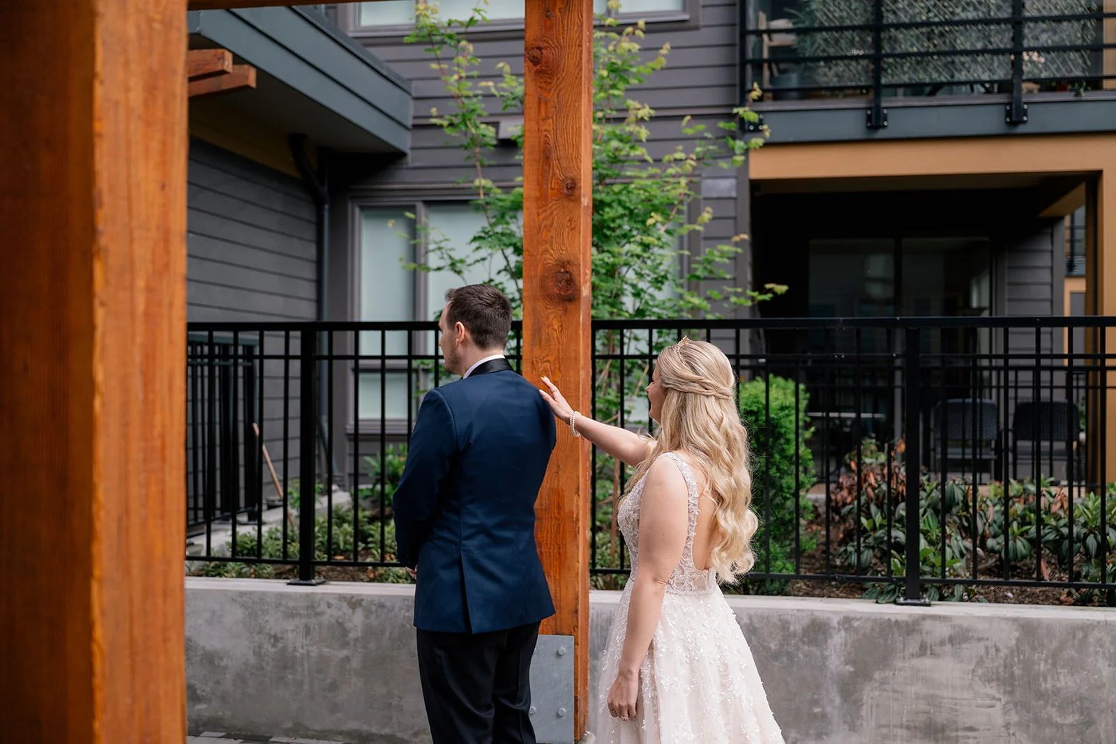 Bride and groom seeing each other for the first time on their wedding day, sharing an emotional and heartfelt moment.