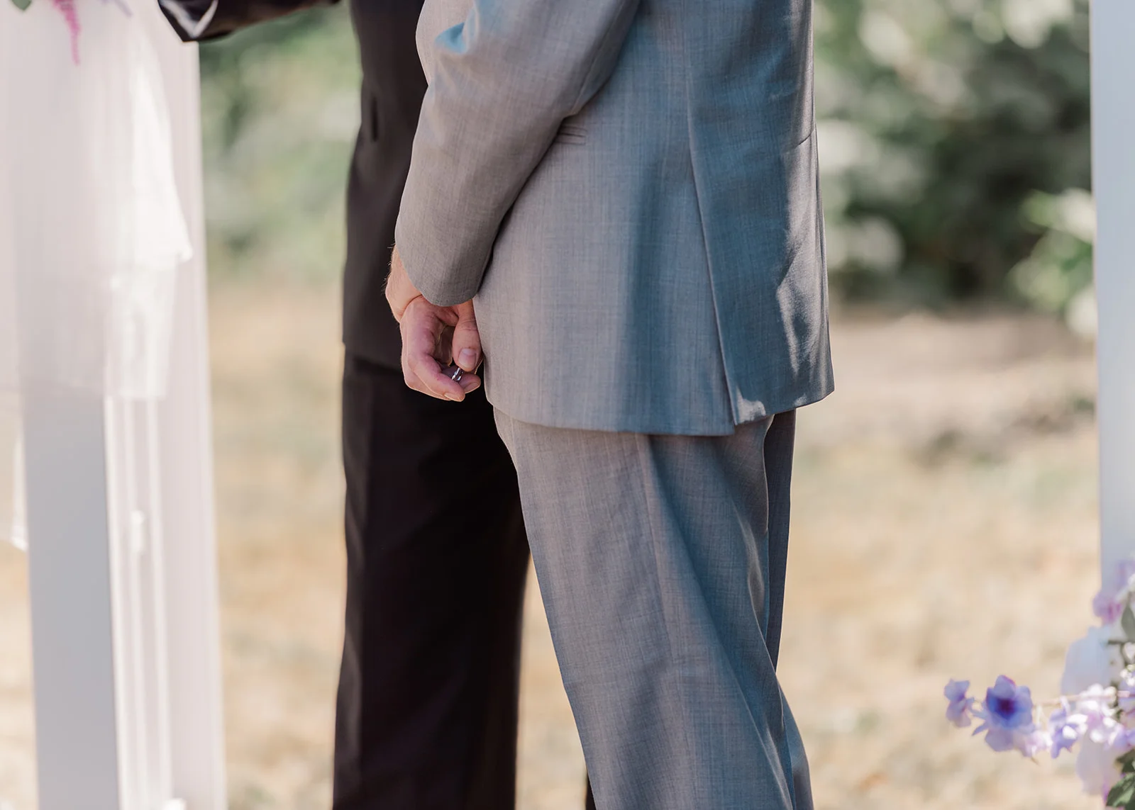 ring exchange at a summer backyard wedding in mission, british columbia