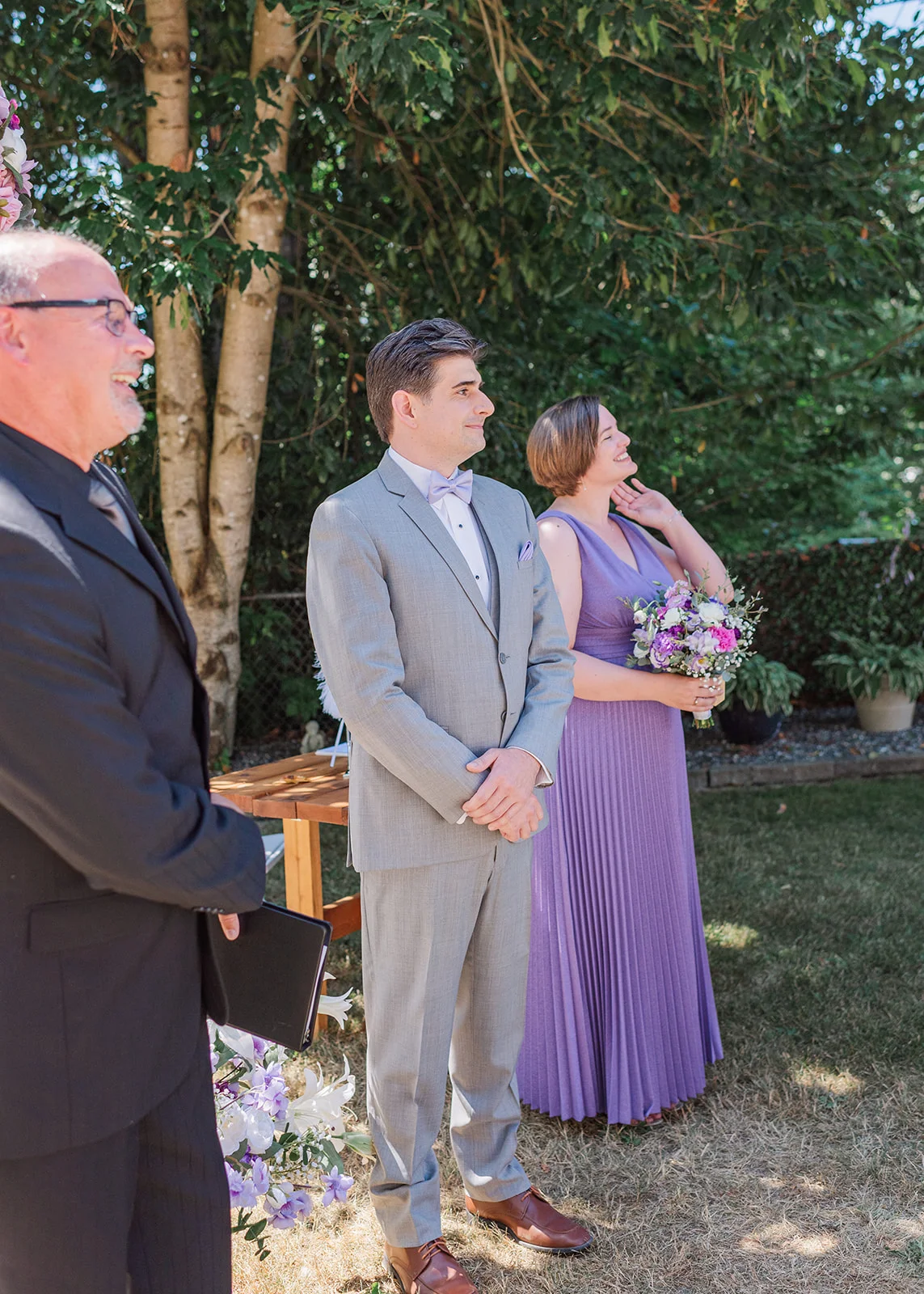groom watching bride walk down the aisle backyard wedding mission, british columbia
